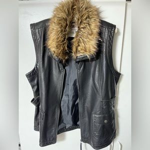Women’s  black faux leather vest with detachable faux fur collar.